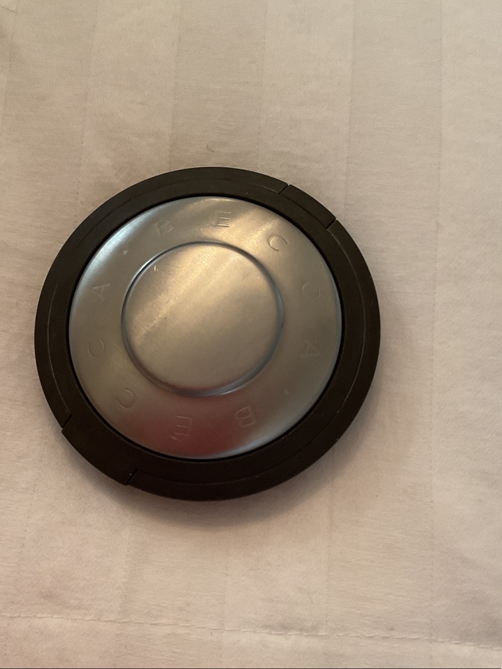 BECCA Cream Highlighter Compact in Light Pink